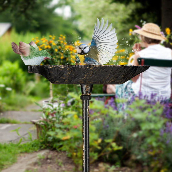 Cast iron bird bath on pole