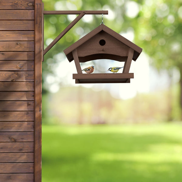 Brown hanging bird feeder wall