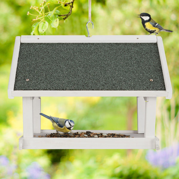 White hanging bird feeder wall