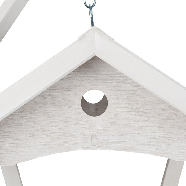 White hanging bird feeder wall