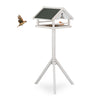 White bird feeder on stand