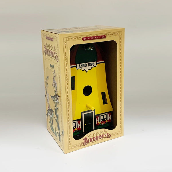 Birdhouse yellow polder mill with wing