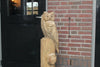 Houtsculptuur uil op stam