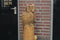 Houtsculptuur uil op stam