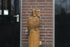 Holzskulptur Eule auf Baumstamm